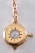 Charles Frodsham FMSZ. An 18ct gold keyless half-hunter fob watch the circular white enamel dial