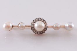 An early 20th Century gold, half pearl and diamond bar brooch.