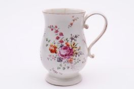 A Derby mug of baluster shape with ridged  scroll handle, painted in enamels in ‘cotton stem’