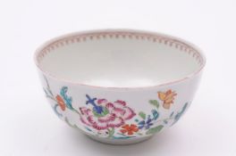 A Chaffer’s Liverpool slop bowl painted in bright famille rose colours with oriental flowers, a