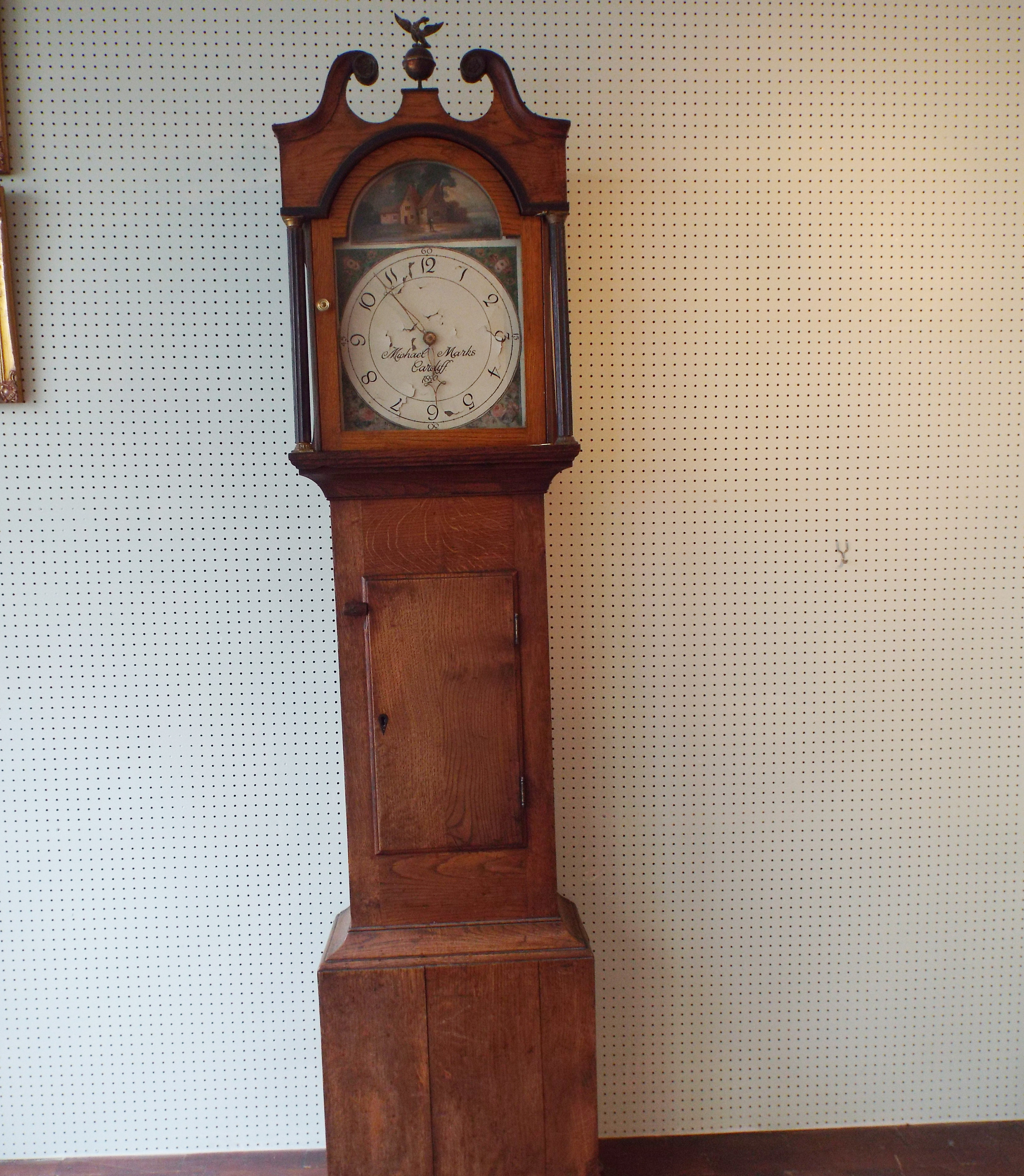 EARLY 19th CENTURY GRANDFATHER CLOCK IN OAK CASE WITH PAINTED DIAL BY MICHAEL MARKS CARDIFF, 1820.