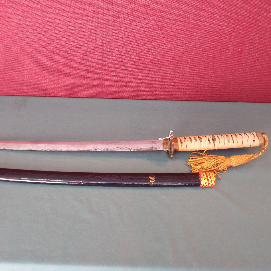 JAPANESE LONG SWORD WITH BLACK LACQUERED SCABBARD.