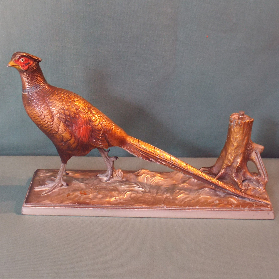 LARGE COLD PAINTED SPELTER TABLE LIGHTER MODELLED AS A GOLDEN PHEASANT.