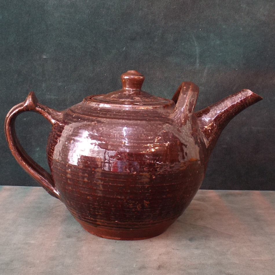 LARGE BROWN POTTERY TEAPOT BY SETH CARDEW WITH IMPRESSED MARK.