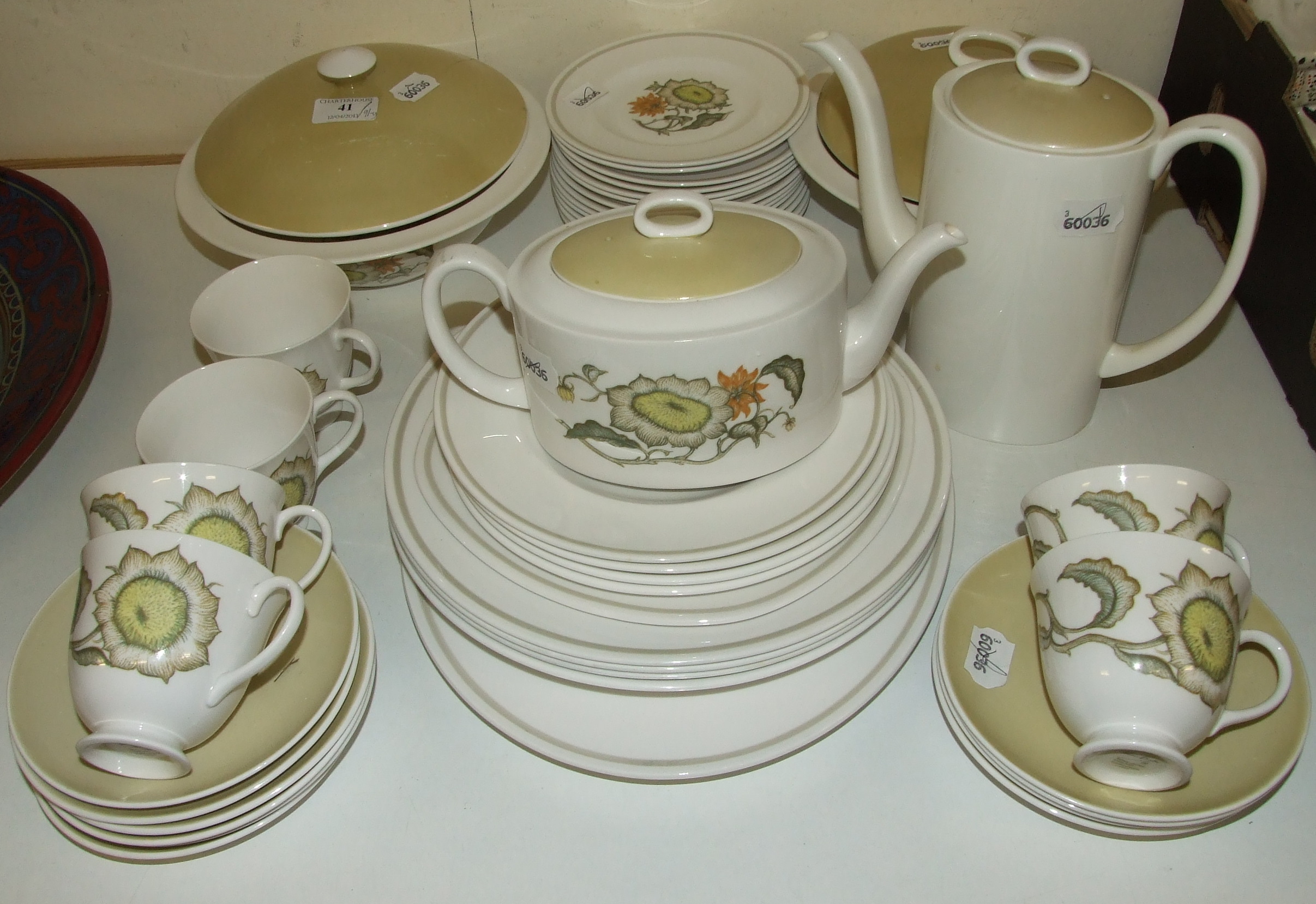 A Susie Cooper Sunflower pattern part tea and dinner service, with an associated coffee pot and