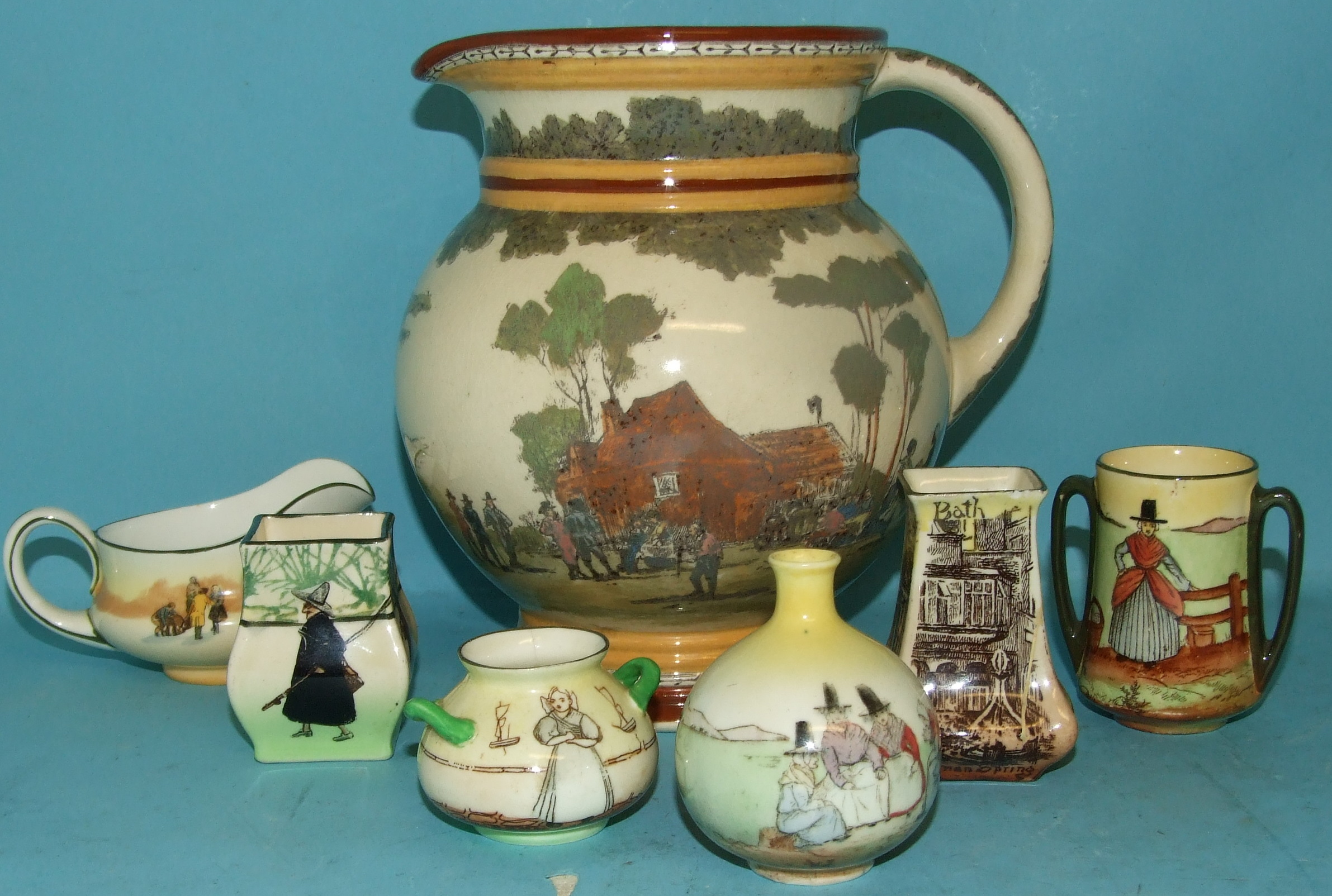 A quantity of Royal Doulton Seriesware items, including a coaching series jug (qty)