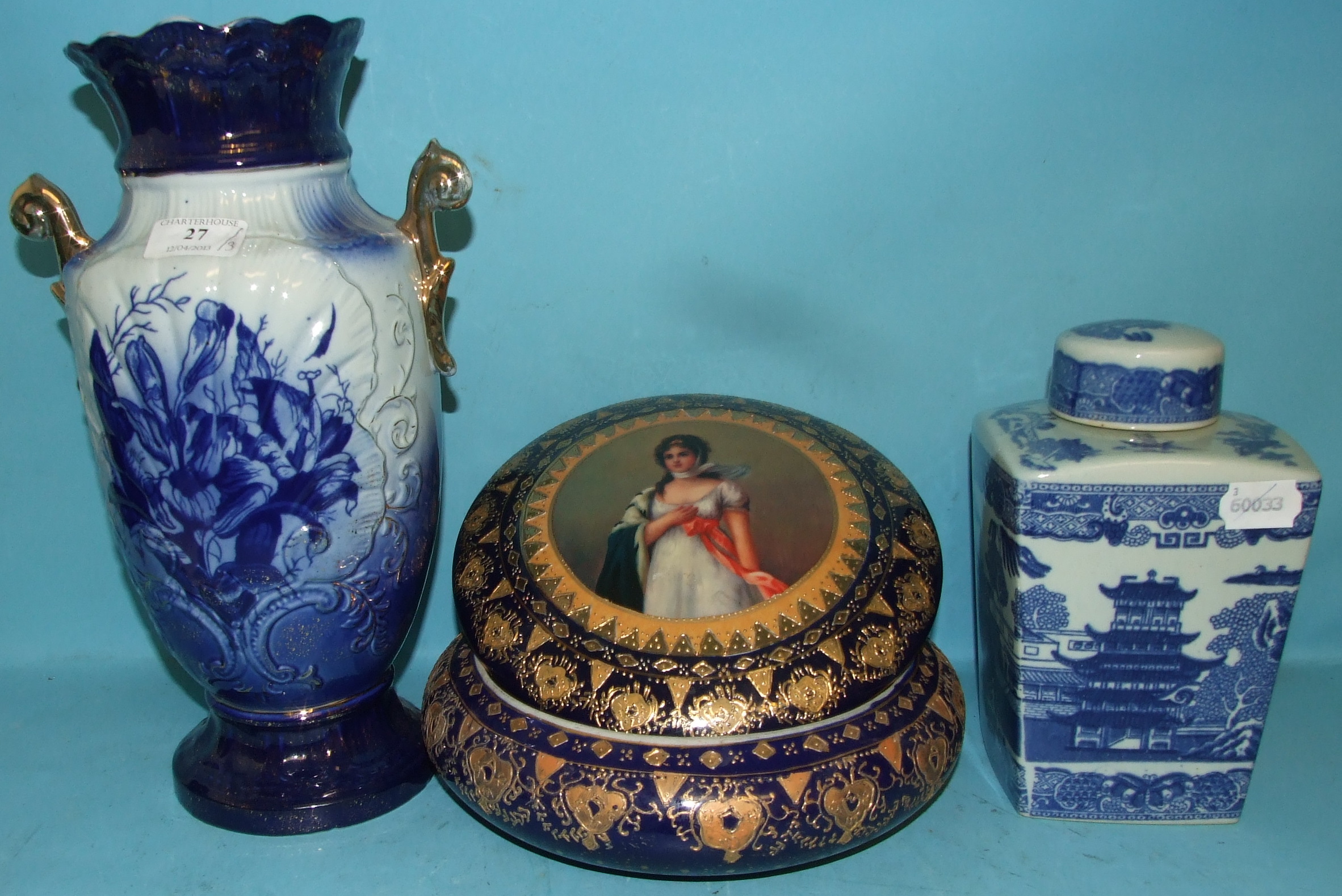 A pottery vase, 34 cm high, a pottery tea caddy and a circular box (3)