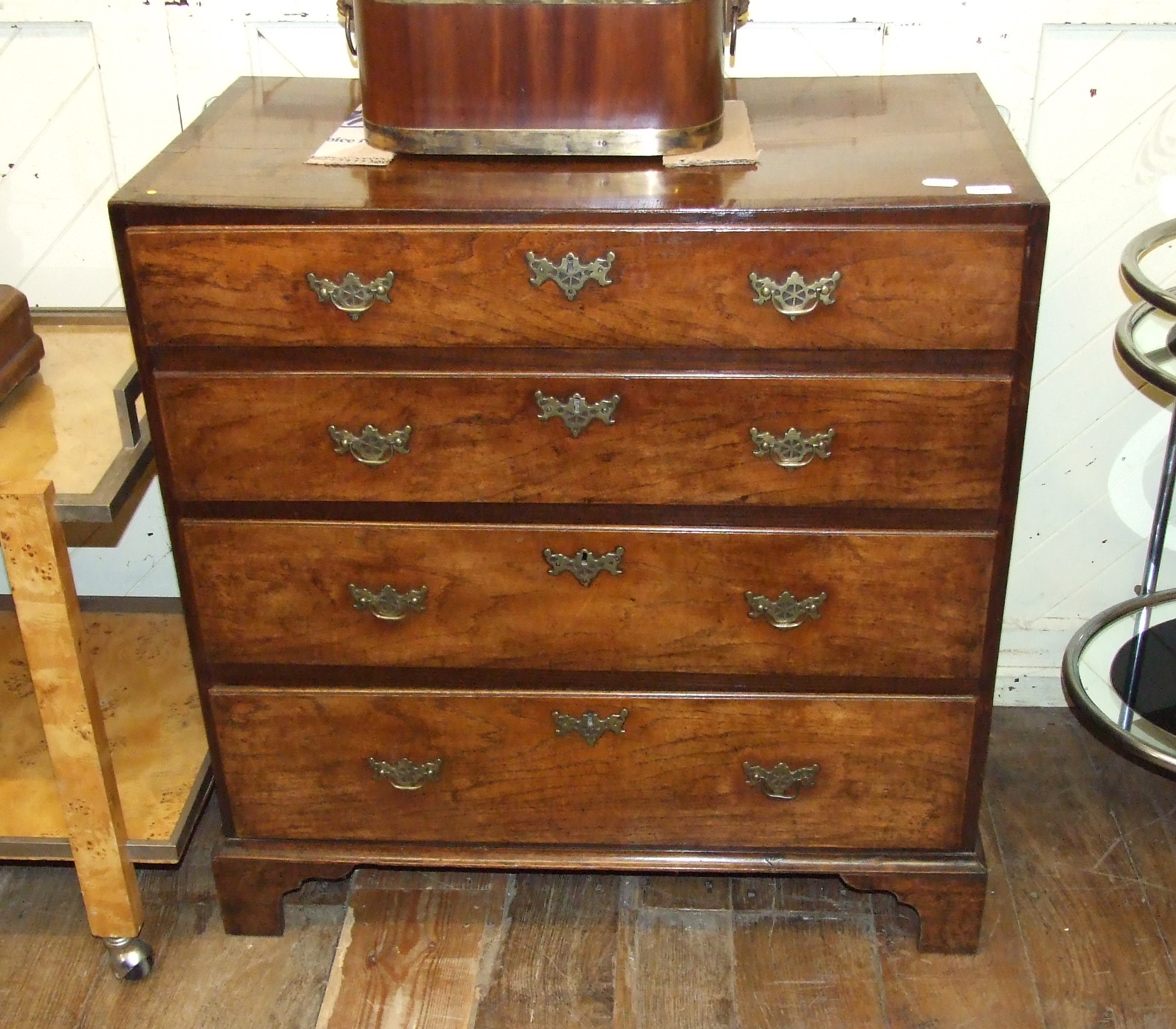 A 19th century oak chest, of four graduated long drawers, 85 cm wide