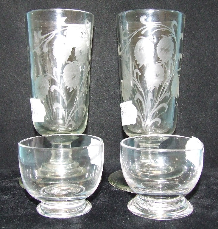 A pair of ale glasses, with etched decoration, and two smaller glasses (4)