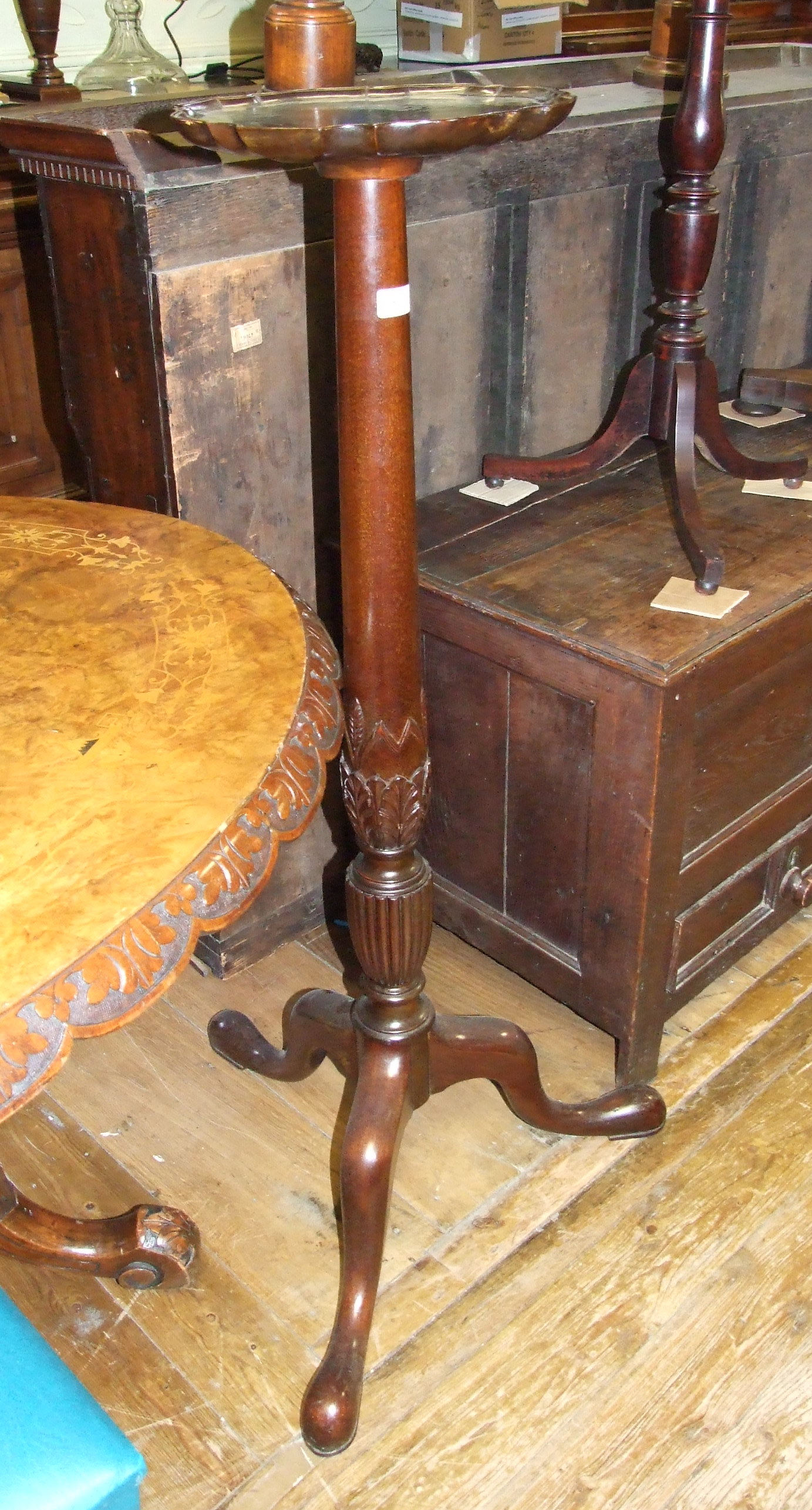 A mahogany jardiniere stand