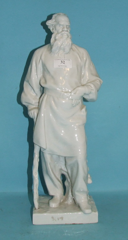 A Continental porcelain figure, of Tolstoy, 44 cm high