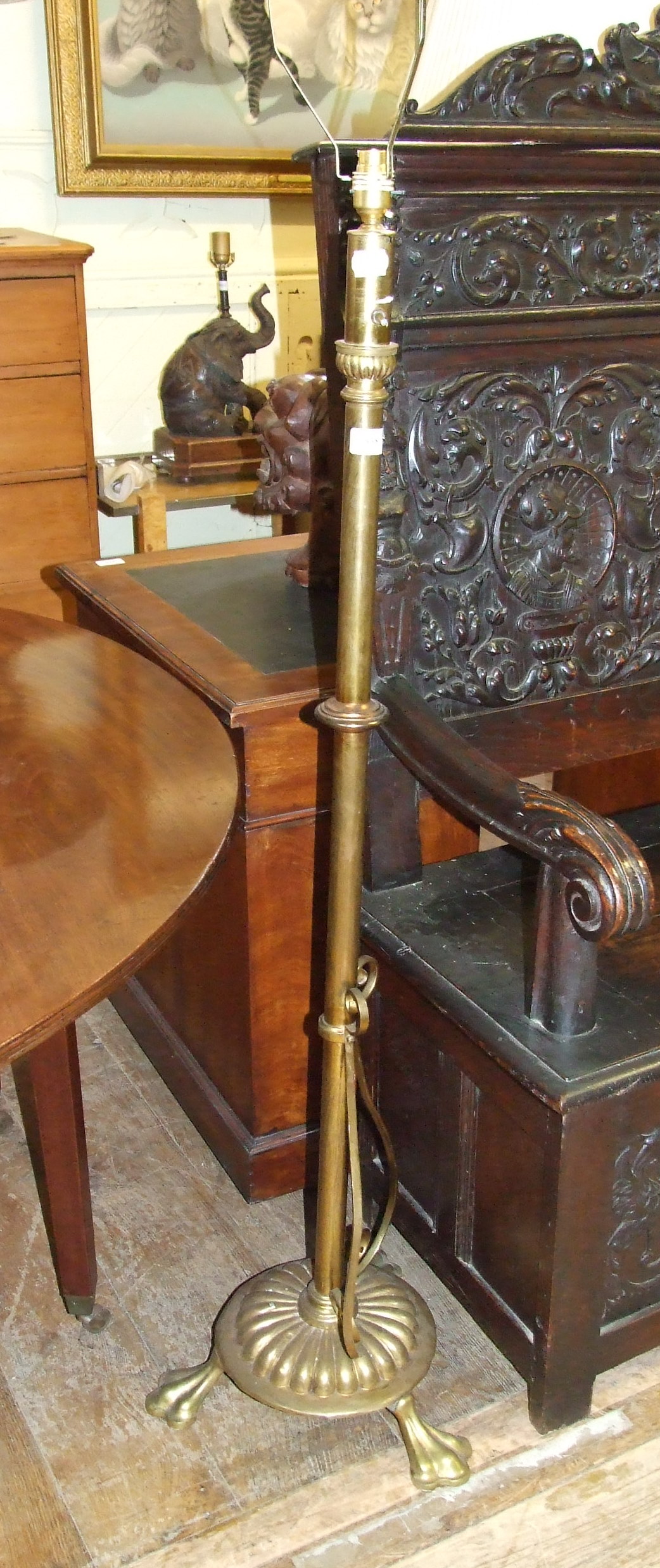 A brass telescopic standard lamp, converted to electricity