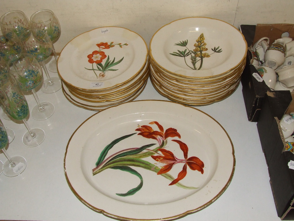 A 19th century Derby botanical service, decorated flowers, comprising eight plates, ten bowls, and a