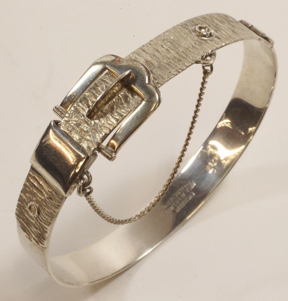 -Click here to bid -   Vintage Silver buckle bracelet by Excalibur (est. £30-£50)