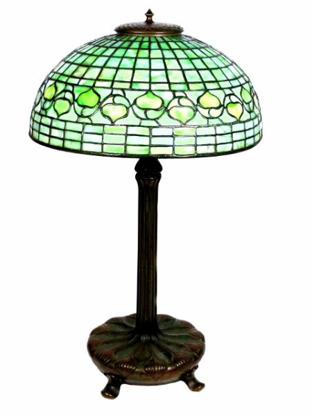 -Click here to bid -   A Favrile Glass and Patinated `Acorn` table lamp, circa 1910 in green and