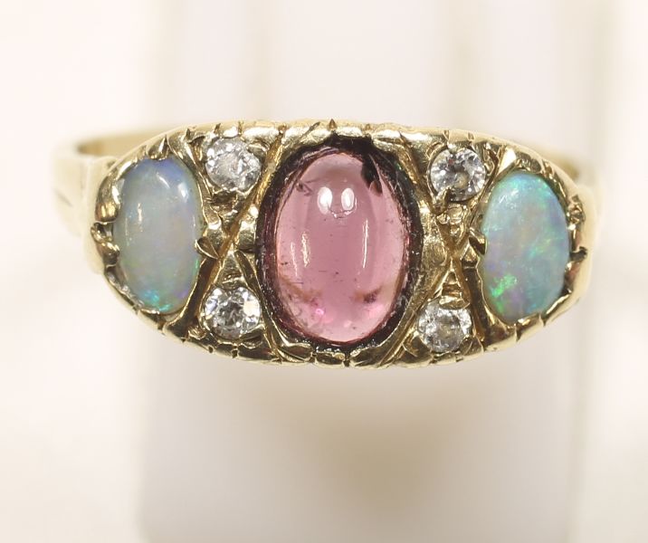 -Click here to bid -   Victorian style 9ct Gold vintage Opal and Garnet ring. Size N-O (est. £60-£