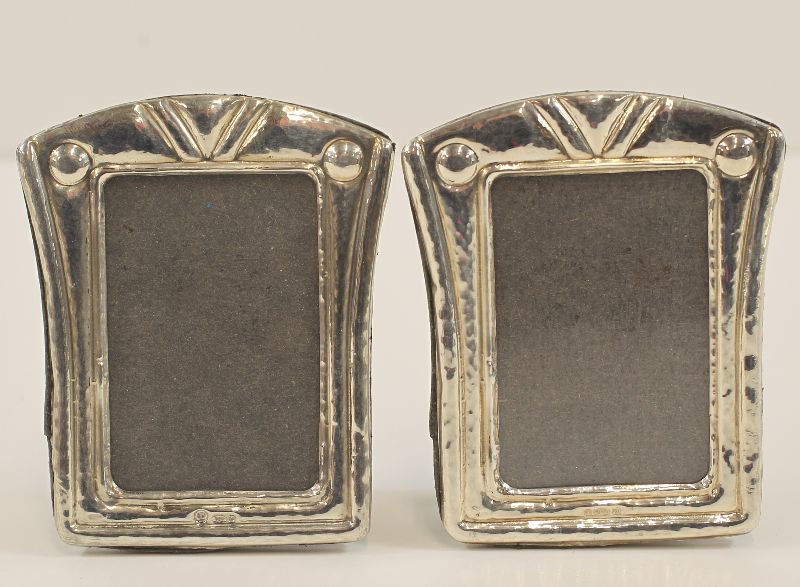 -Click here to bid -   Pair of arts & crafts design Silver photo frames (55mm x 67mm) (est. £50-£