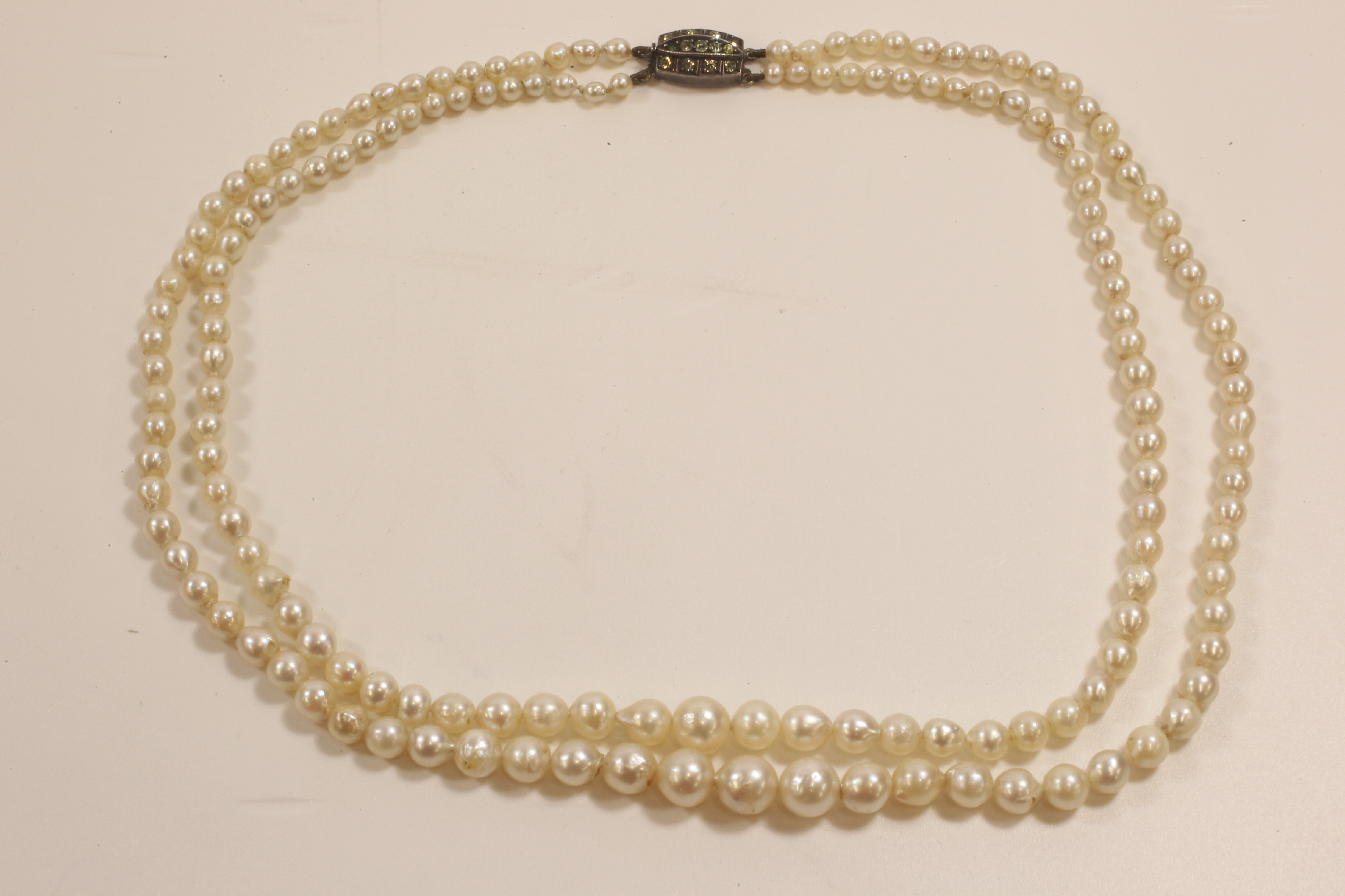 -Click here to bid -   Twin strand graduated vintage cultured Pearl necklace with paste stone set