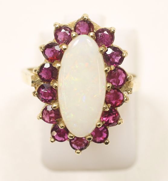 -Click here to bid -   Vintage Opal and Ruby 9ct Gold cluster ring. Size M-N (est. £80-£100)