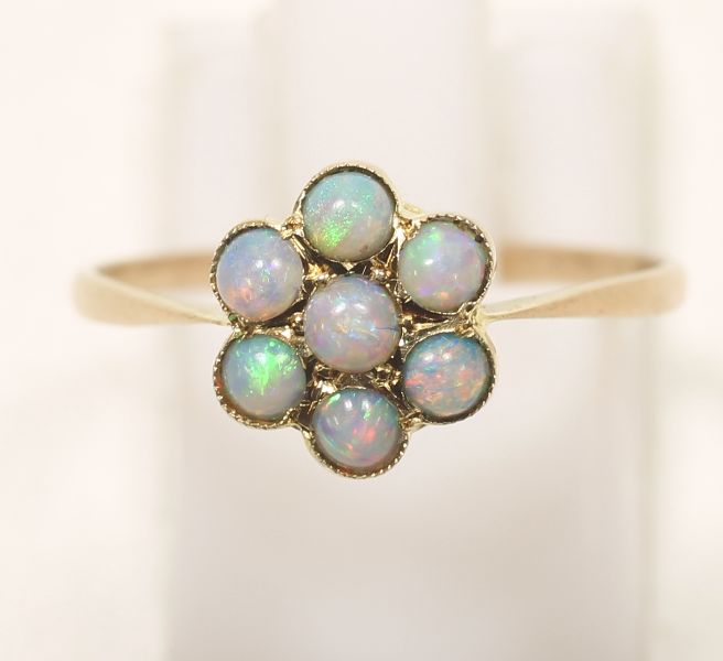 -Click here to bid -   Vintage Opal cluster ring 9ct c.1920. Size O (est. £90-£120)