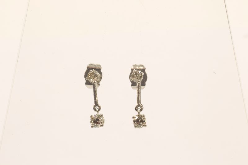 -Click here to bid -   Pair of interchangeable Diamond stud/drop earrings, white Gold 0.55 carats