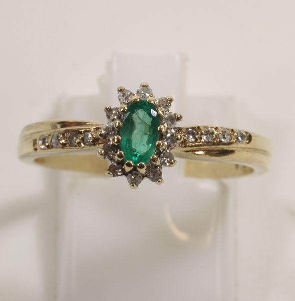 -Click here to bid -   Diamond and Emerald 9ct Gold cluster ring. Size Q (est. £100-£150)