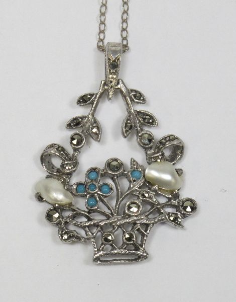 SILVER, MARCASITE, MOTHER-OF-PEARL AND TURQUOISE PENDANT (3.5 X 5CM) ON SILVER CHAIN (44CM)Bidding