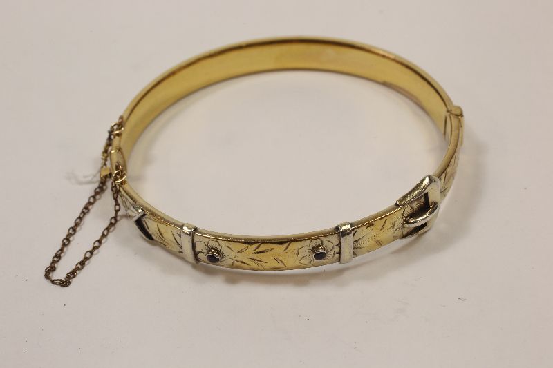 `9CT METAL CORE` BUCKLE BRACELET. 8MM WIDTHBidding is taking place on our sister site bidspotter.