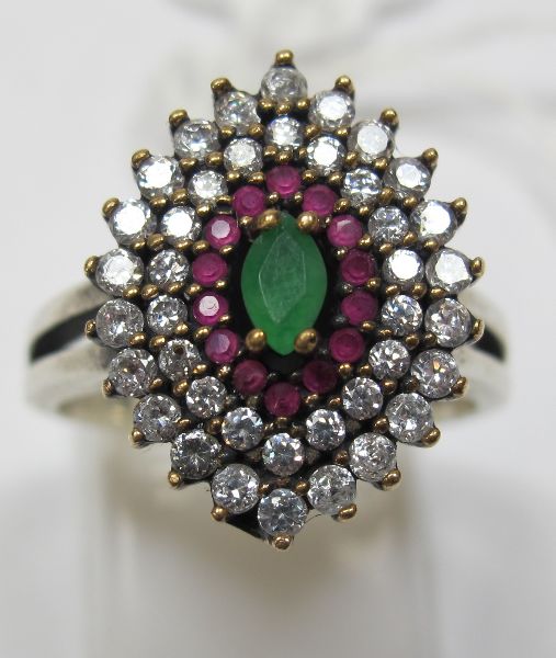 GREEN & WHITE GEM SET SILVER RING O½ Bidding is taking place on our sister site bidspotter.co.uk