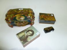 Russian papier mache snuff box decorated with figures playing instruments and dancing and three