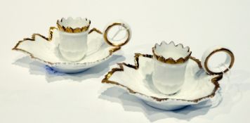 Pair early 19th century Spode chambersticks, of modelled leaf form, with gilt borders, marked "