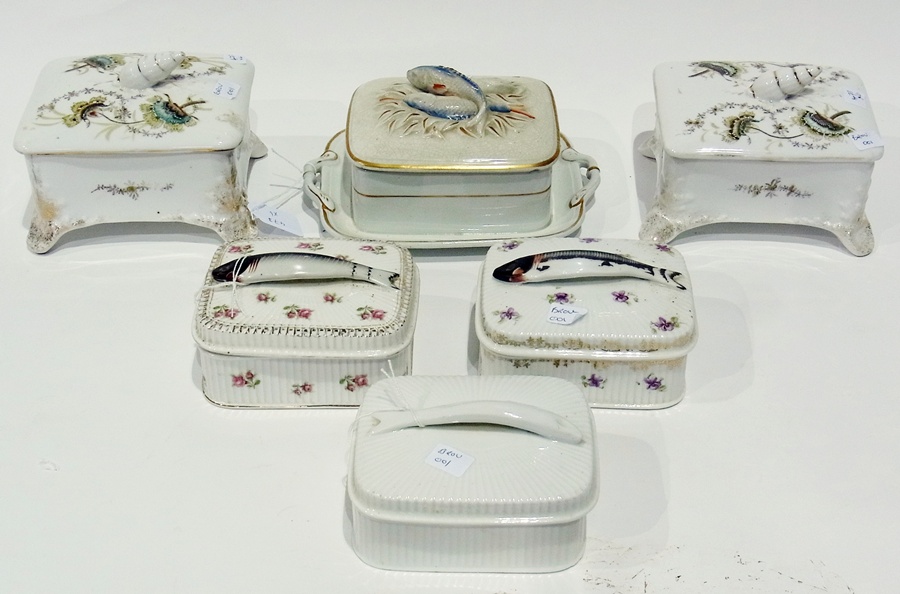 Four various covered sardine dishes and pair continental china covered boxes with shell finials to