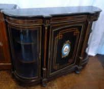 Victorian ebonised credenza, inlaid satinwood banding, with oval mounted plaque and painted head and