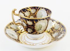 Early nineteenth-century (c. 1815) Minton porcelain cup and saucer, London shape, painted with white