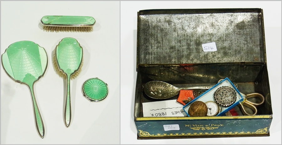 Silver-plated and green enamelled three-piece dressing table set,  a similar powder compact, badges,