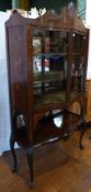 Early 20th century continental marquetry inlaid mahogany china display cabinet, serpentine fronted