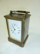 Swiss carriage timepiece in brass case, 13 cms high