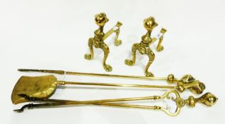 Brass fireside set viz:- pair tongs, poker and brush, pair firedogs, all with claw finials