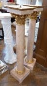 Pair pink marble plinth bases (tops missing), square tops to column bases with gilt mounts on square