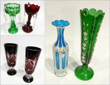 Pair ruby overlay cut glass footed beaker vases, 24cm high, green overlay cut glass lustre with