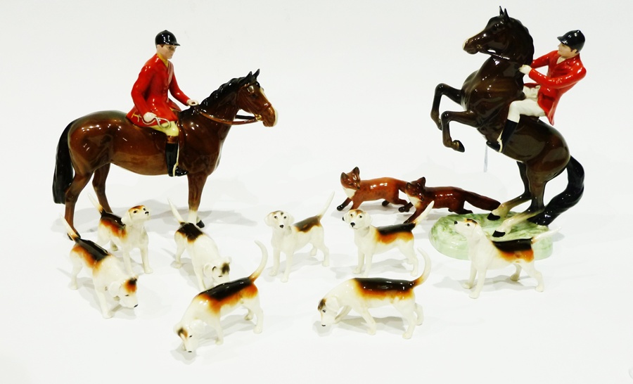 Beswick hunt  to include:- Huntsmen, two foxes and eight hounds