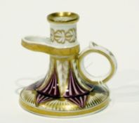 Early 19th century Coalport chamberstick, with circular base, decorated with puce and gilt Regency-