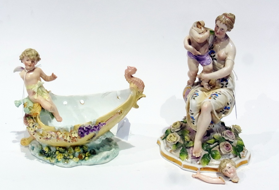 Meissen style figure of Mother and child, the classical figure seated with cherubesque figure on her