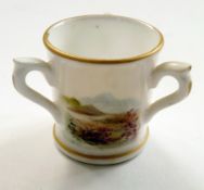 Royal Worcester-style porcelain three-handled cup, decorated with overglaze painted landscape, 3.5cm