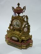 French ormolu Sevres style porcelain mantel clock with pink porcelain urn surmount, having ormolu