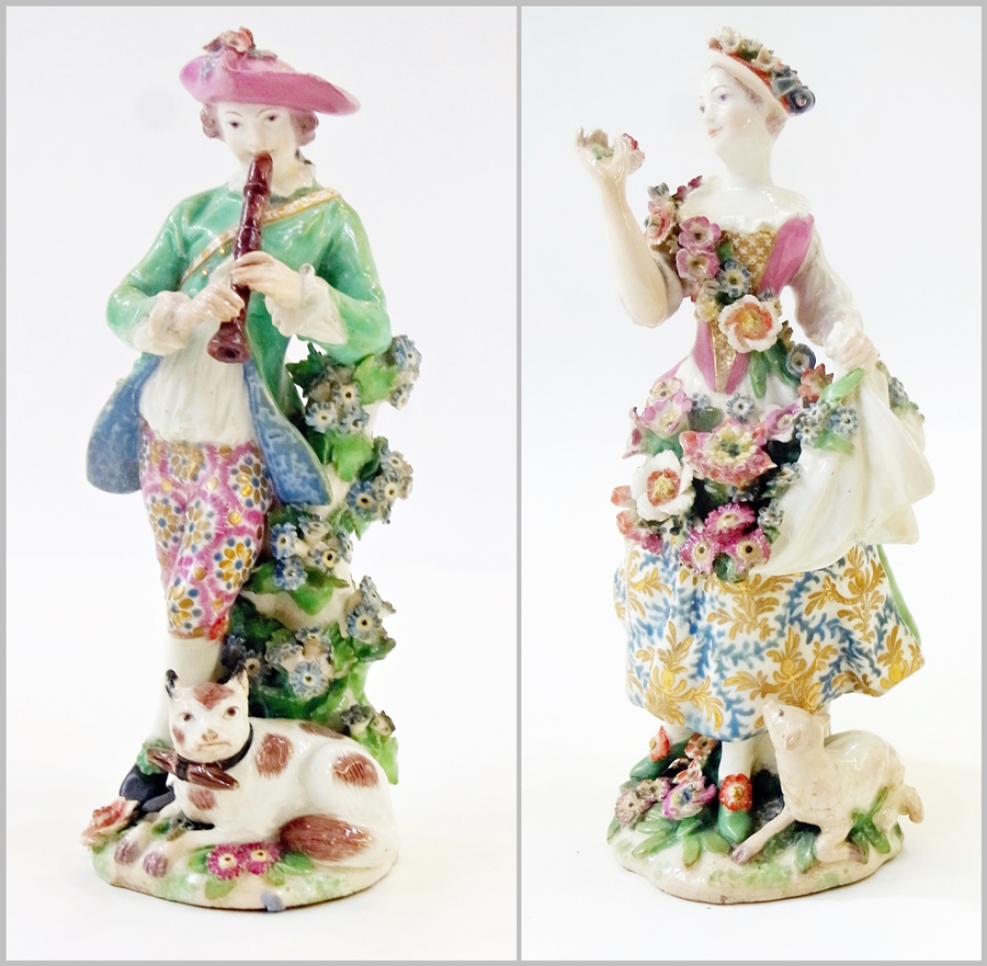 Pair eighteenth-century Chelsea porcelain figures, the boy wearing a pink hat and playing pipe,