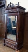 French mahogany single wardrobe with broken arch pediment to top, panelled frieze, two turned column