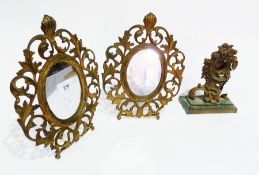 Pair of gilt metal framed mirrors and a watch stand (3)