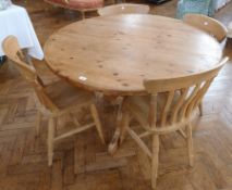 Twentieth century pine circular kitchen table on tripod supports and four kitchen chairs (5)
