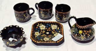 Late 19th century Swiss Thoune pottery small jug, three matching cups, small bowl with everted